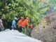 Officers evacuates victims of a landslide in Klungkung on Monday (20/1). (PHOTO from BPBD Klungkung Bali)