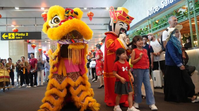 lion dance at bandara Passengers traveling on the special day had the chance to witness a lion dance parade at I Gusti Ngurah Rai Airport - IST