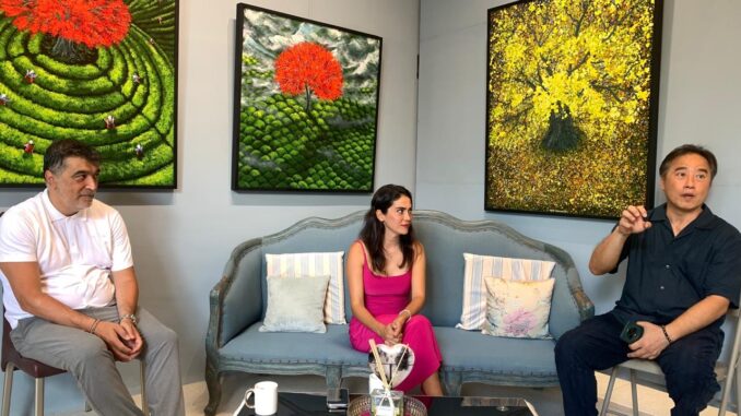 Art observer from Türkiye, Cem Bülent Ünal, painter Halime Türkyılmaz and owner of Art Xchange Gallery Benny Oentoro at a press conference, 29 July 20206 – IST