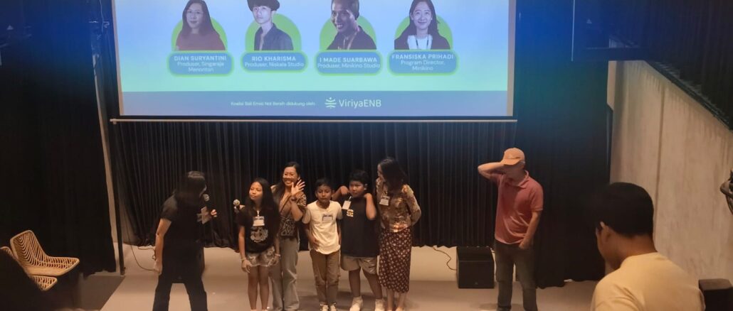 Where The Sun is Harvested film producer Dian Suryantini with three child actors during a screening at the 2026 Bali Climate Week People's Festival - IST