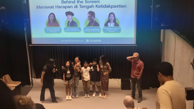 Where The Sun is Harvested film producer Dian Suryantini with three child actors during a screening at the 2026 Bali Climate Week People's Festival - IST